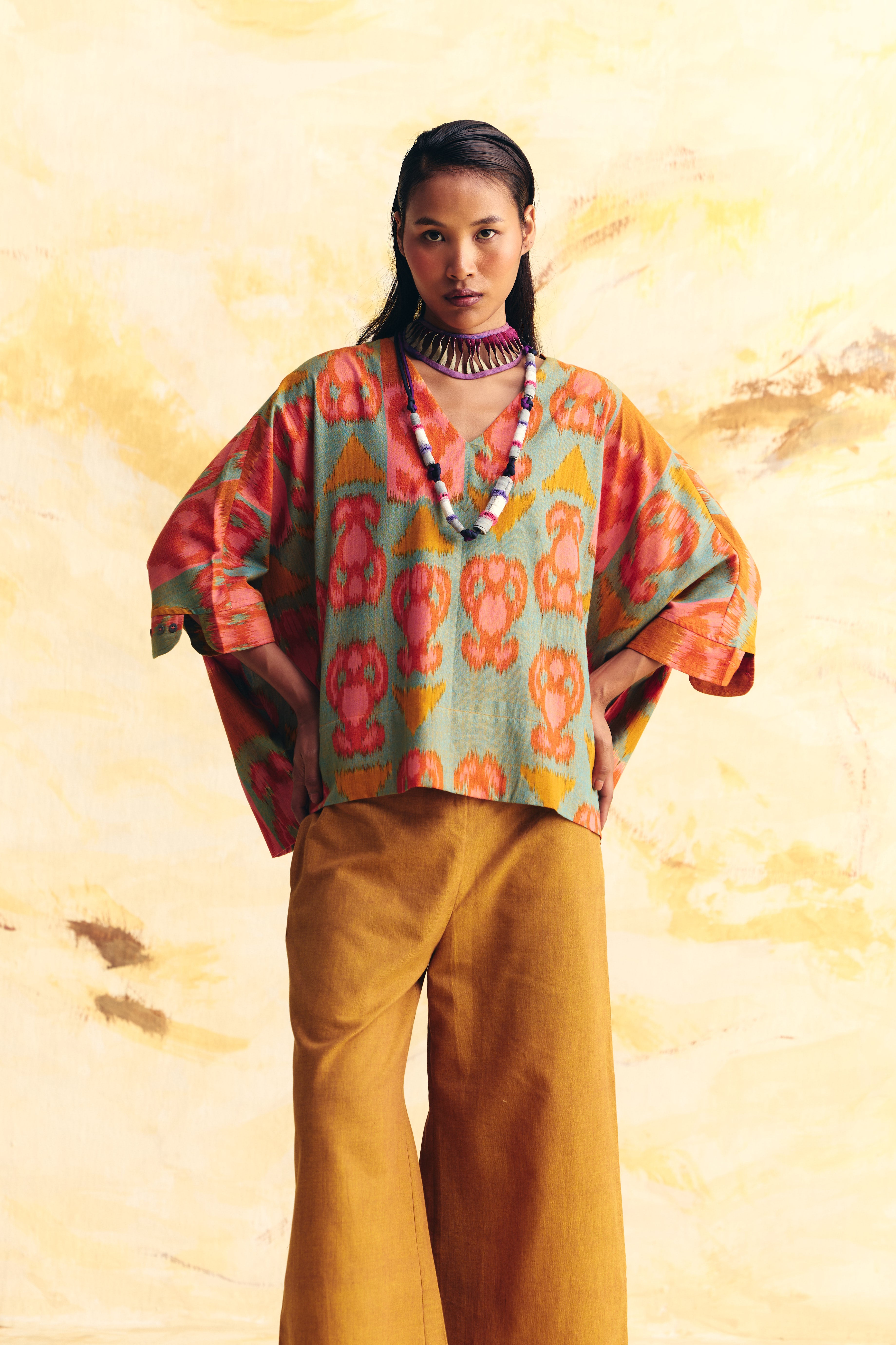 EMBER DOLMAN BUTTON CUFF TOP